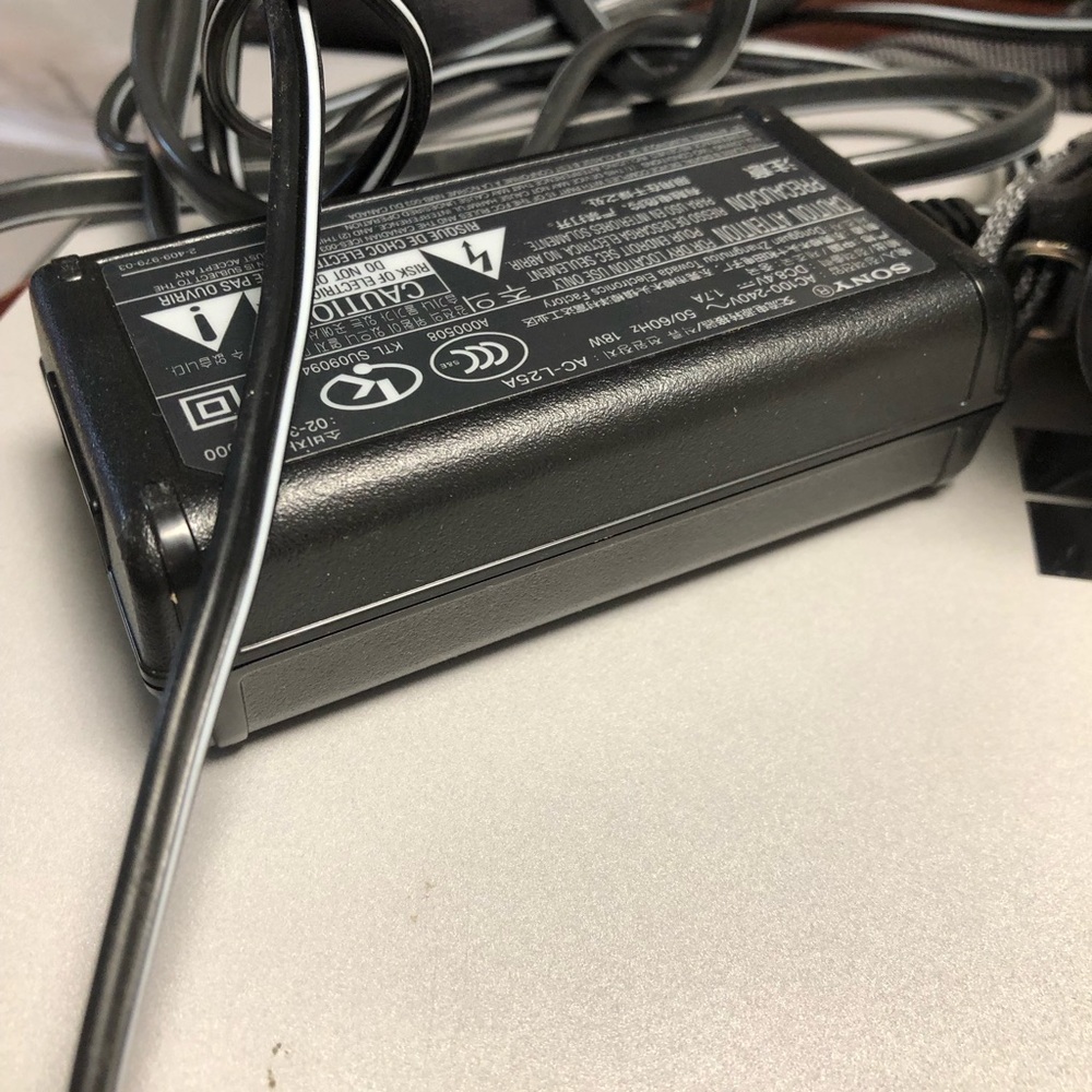 Sony Silver Handycam with Black Adapter